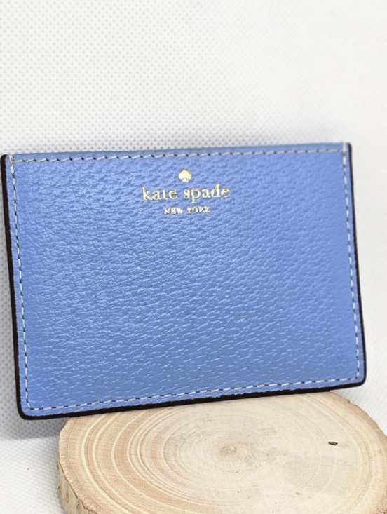kate spade Handbags - kate spade Blue Leather Card Sleeve with Gold Logo
